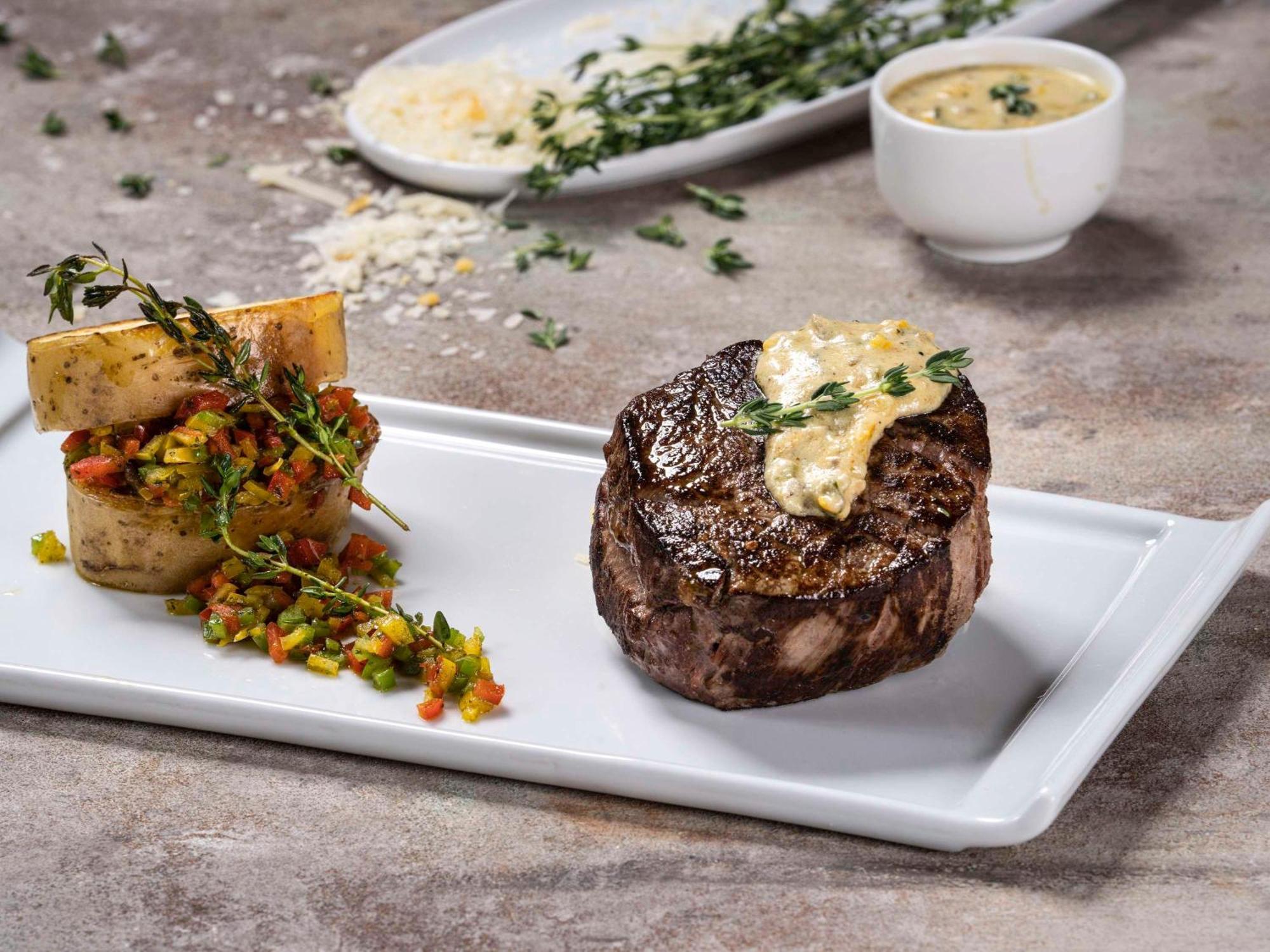 Movenpick Hotel And Residences Ριάντ Εξωτερικό φωτογραφία A steak prepared with a butter sauce